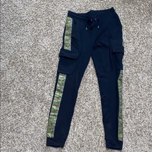 Black jogger pants with camo stripe